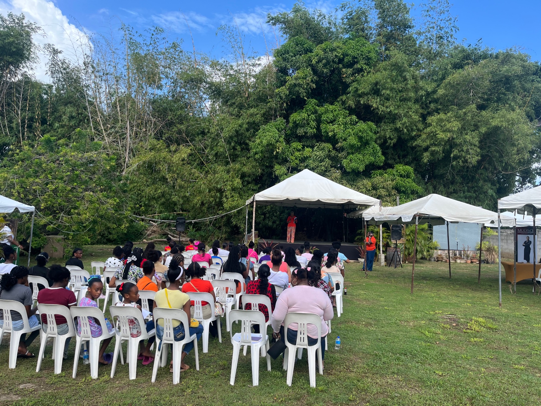 Outdoor presentation hosted by Arouca Soul Kitchen volunteers at a community event in Trinidad and Tobago Outdoor presentation hosted by Arouca Soul Kitchen volunteers at a community event in Trinidad and Tobago